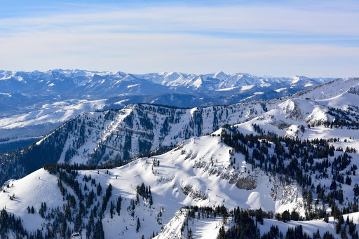 Stunning Aerial View of Snow Covered Mountains